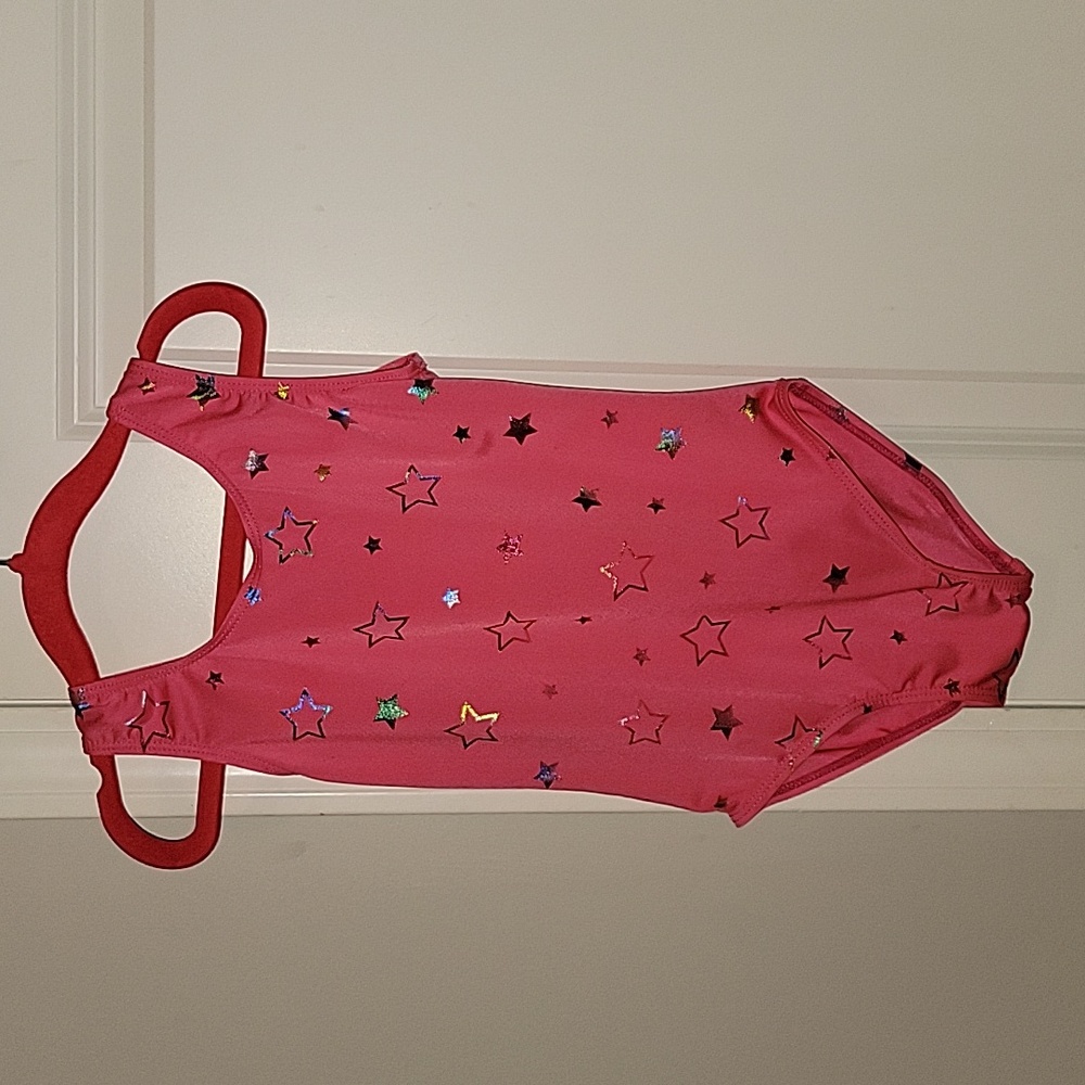 Girl's Pink gymnastics leotard with stars, size 4/5
